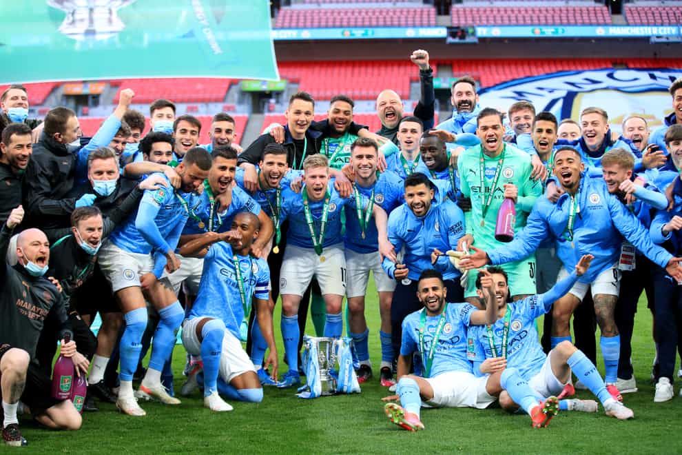 Manchester City celebrate after winning the Carabao Cup final at Wembley