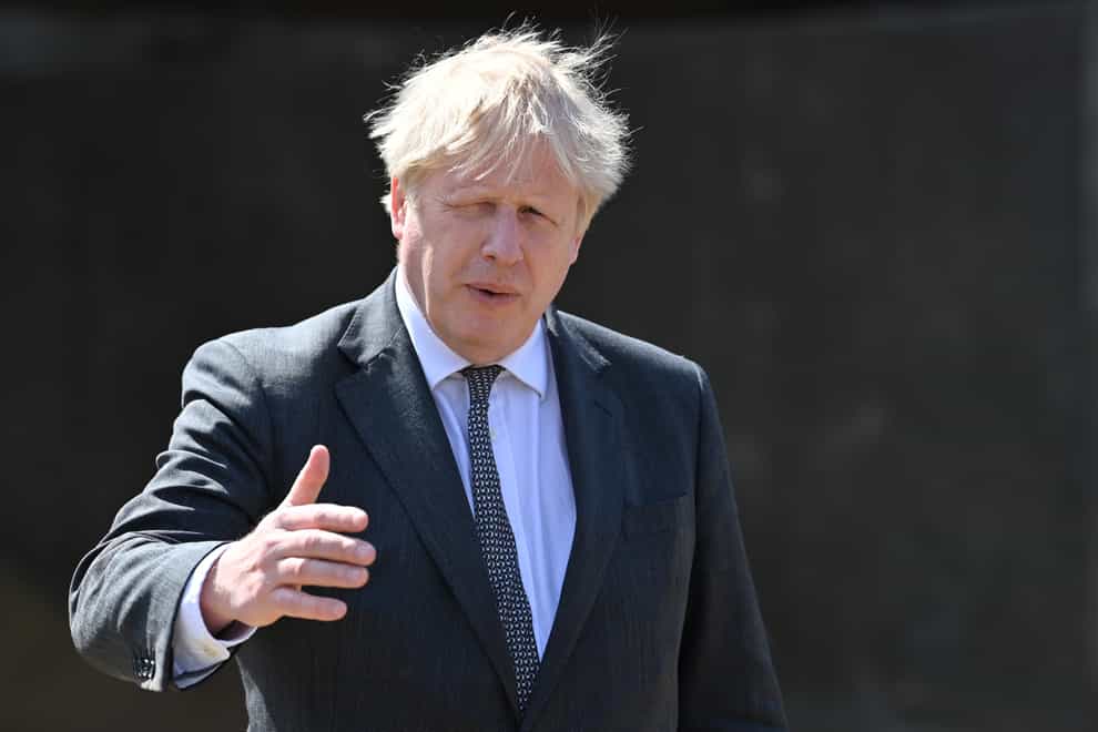 Prime Minister Boris Johnson during a visit to Moreton farm in Clwyd near Wrexham, North Wales, as part of Welsh the Conservative Party's Senedd election campaign