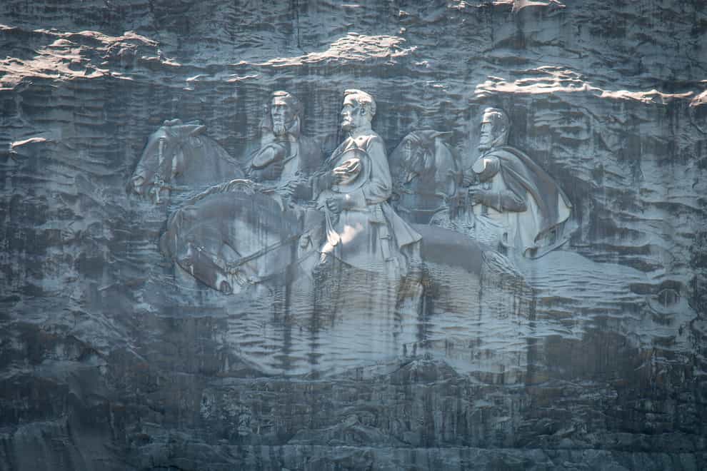 A massive mountainside carving depicting Confederate leaders Jefferson Davis, Robert E. Lee and Stonewall Jackson (Ron Harris/AP)