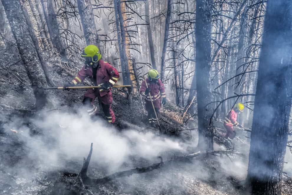 Firefighters putting out a blaze in the South Wales valleys