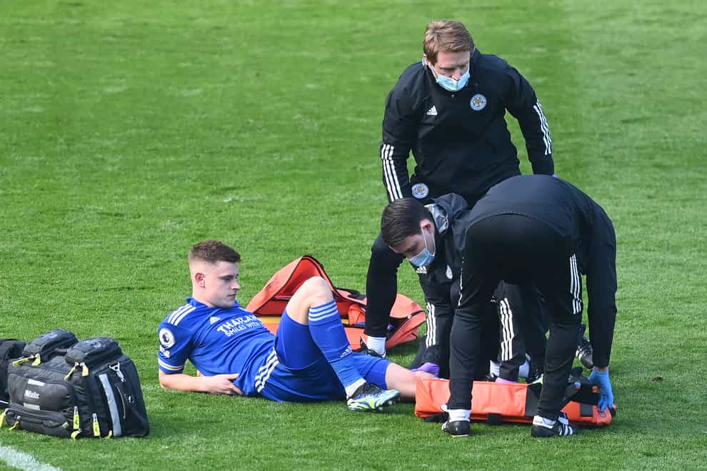 Harvey Barnes receives treatment on the pich