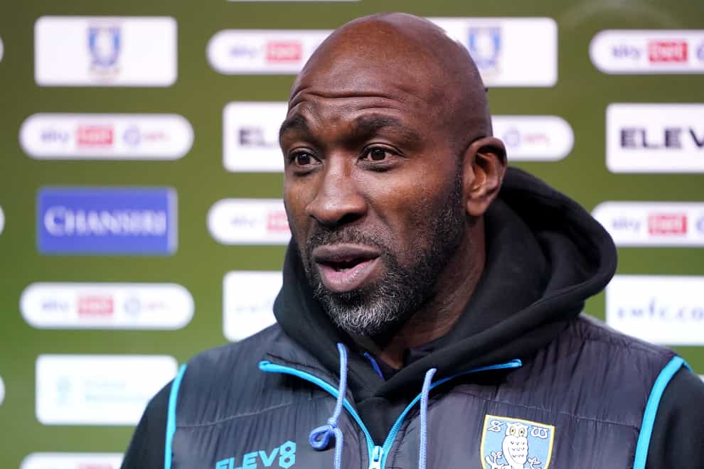Sheffield Wednesday manager Darren Moore talks to the media