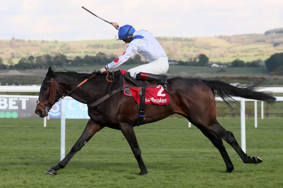 Clan Des Obeaux ridden by Sam Twiston-Davies goes on to win the Ladbrokes Punchestown Gold Cup
