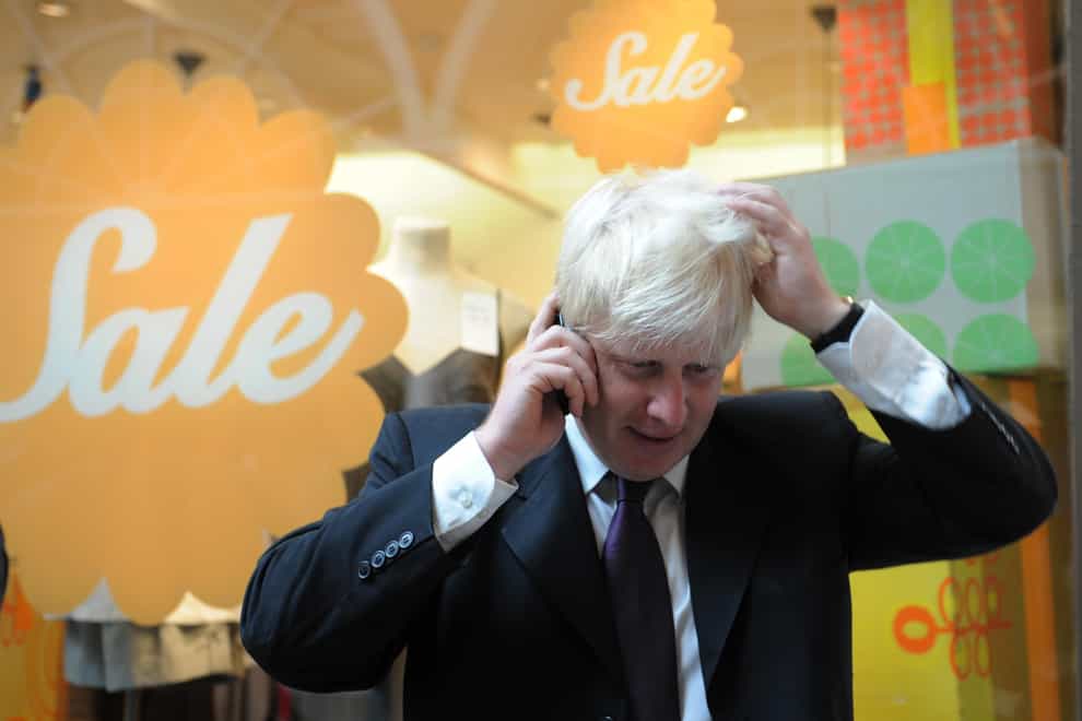 Boris Johnson on the phone while London mayor