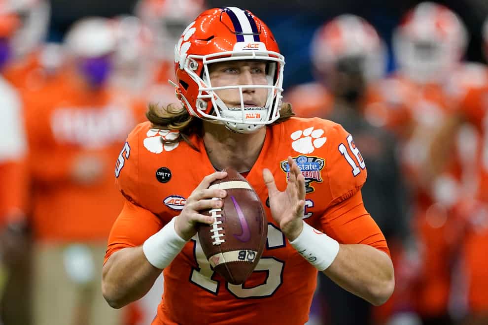 Trevor Lawrence clutches football