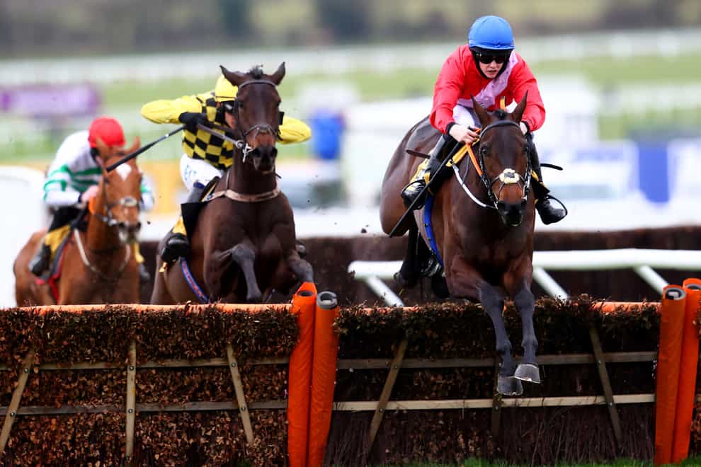 Quilixios (right) on his way to winning the Triumph Hurdle