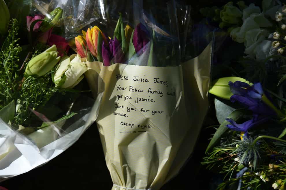 Floral tributes close to the scene in Snowdown, Kent, where the body of PCSO Julia James was found