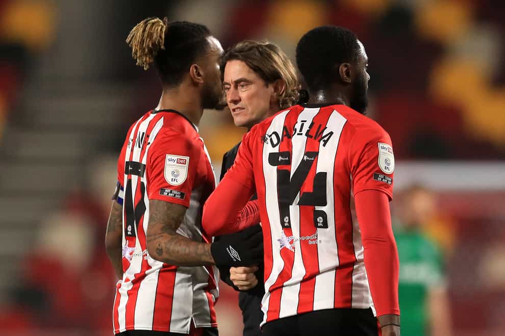 Brentford manager Thomas Frank with Ivan Toney, left