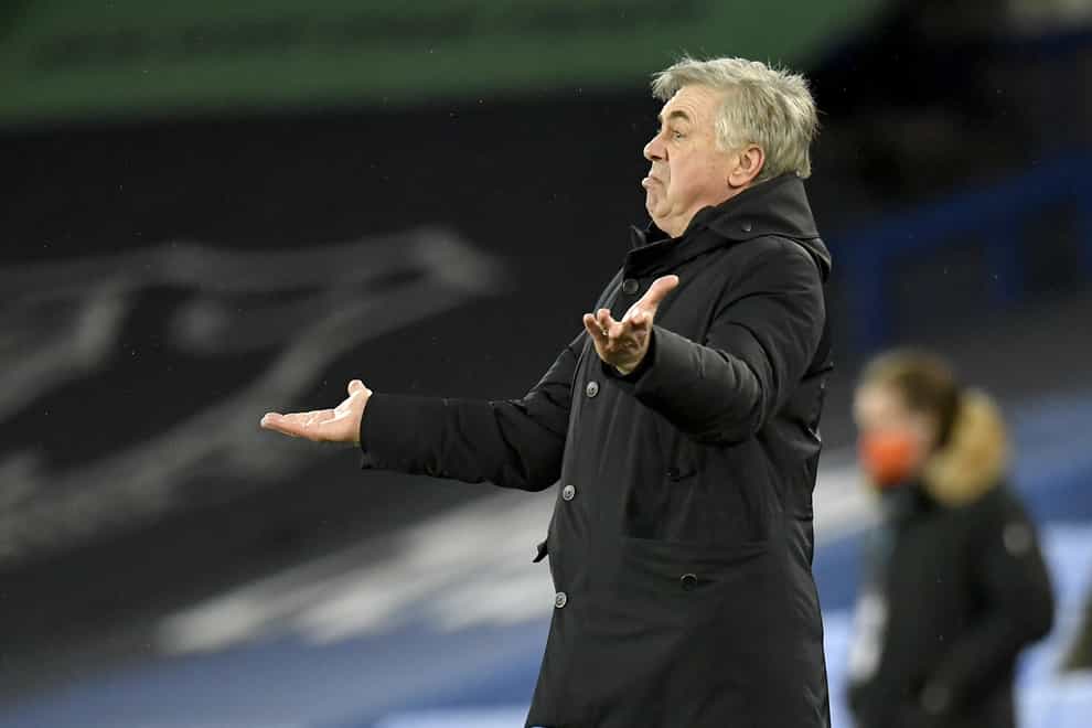 Everton manager Carlo Ancelotti spreads his arms on the touchline
