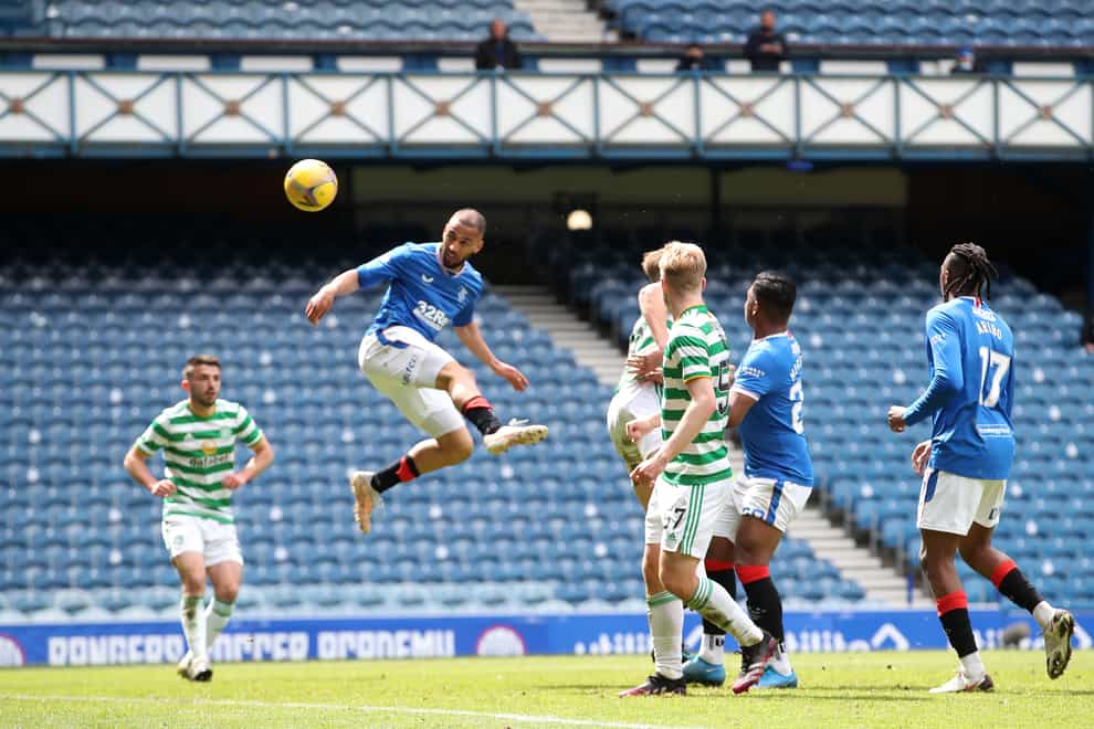 Kemar Roofe heads home his second goal in Rangers' 4-1 Old Firm win over Celtic at Ibrox
