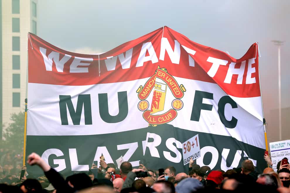Manchester United fans protest against the club's owners, the Glazer family