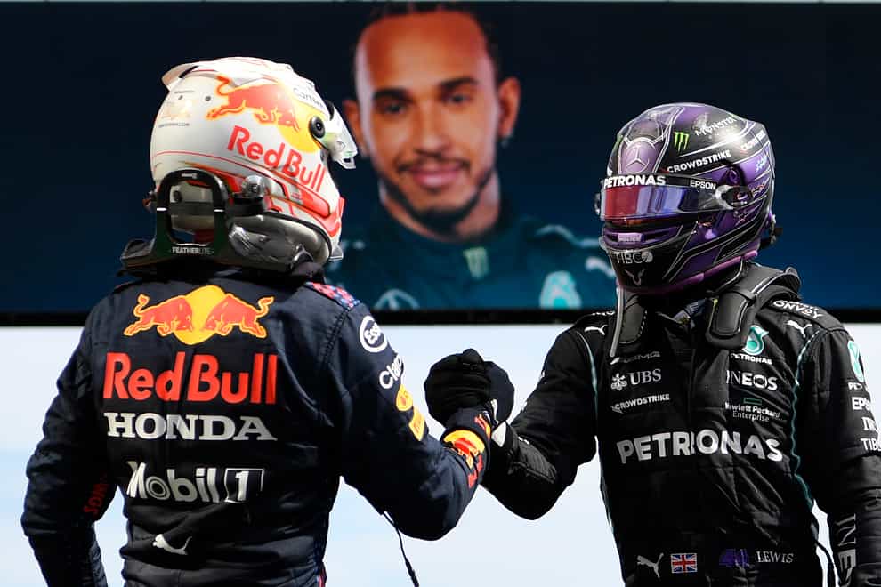 Lewis Hamilton and Max Verstappen shake hands after the race
