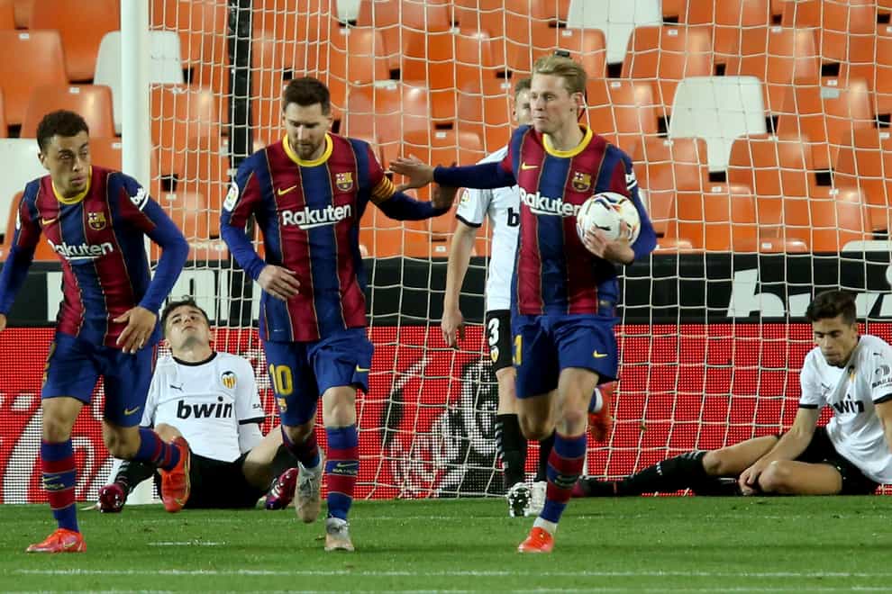 Barcelona’s Lionel Messi celebrates scoring his side’s first goal