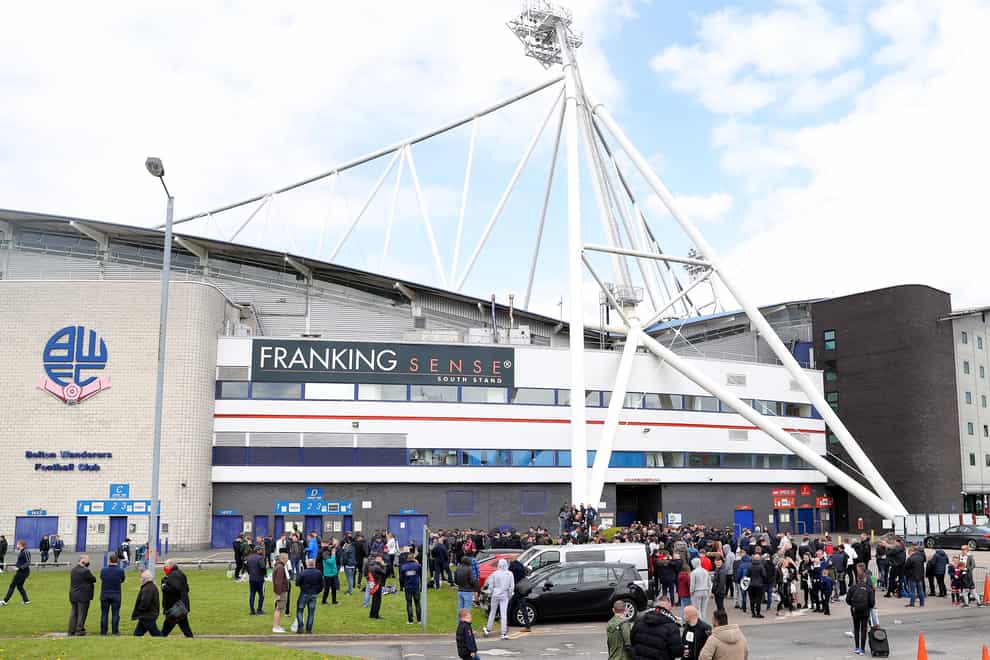 Bolton Wanderers fans gather outside the ground
