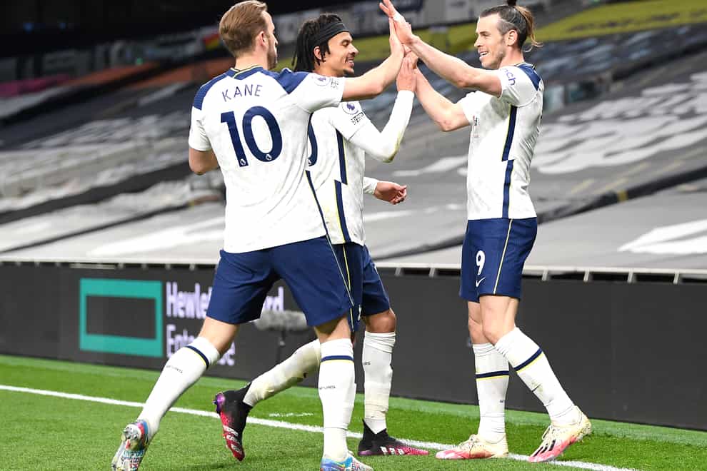 Dele Alli (centre) celebrates with Harry Kane (left) and Gareth Bale