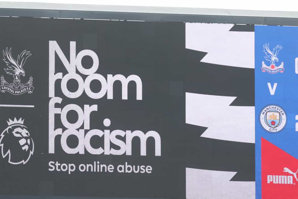 A No room for racism banner