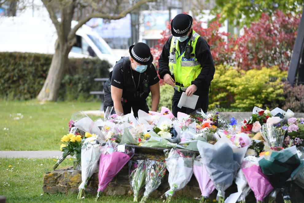 Police officers lay floral tributes to PCSO Julia James