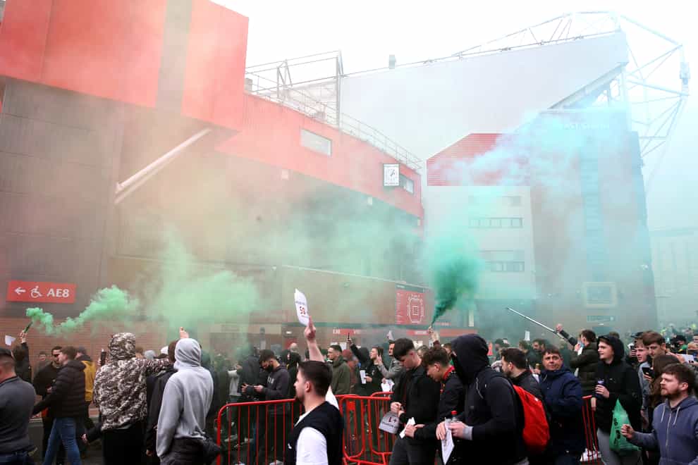 Manchester United fans protest against the club's owners outside Old Trafford on Sunday