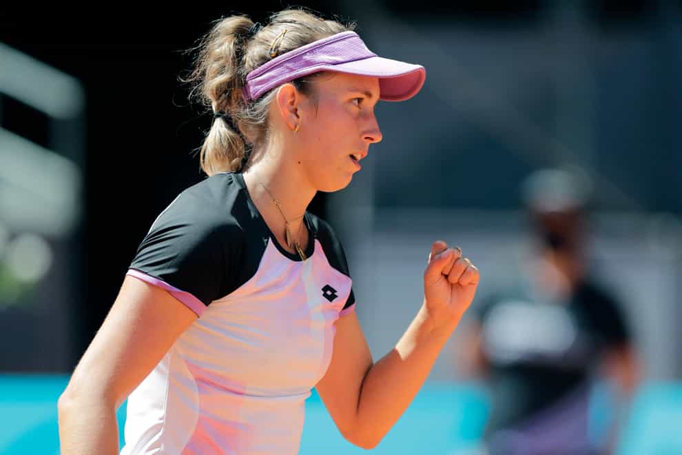Elise Mertens celebrates winning a point during her victory over Simona Halep