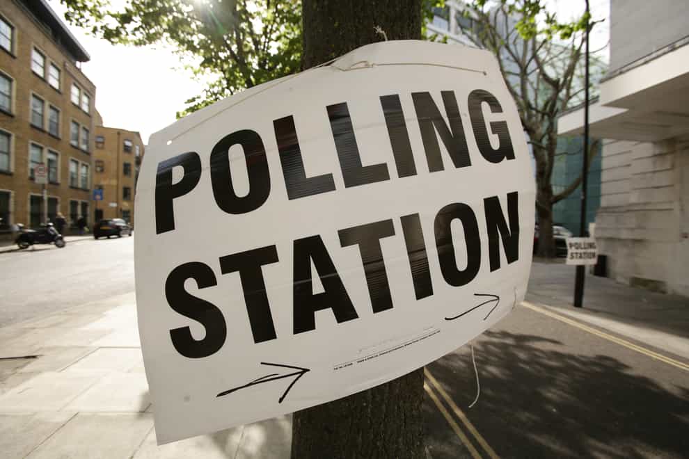 A polling station sign in Hackney in east London (Yui Mok/PA)