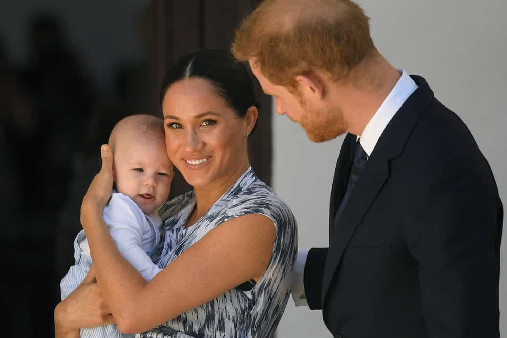 Duke and Duchess of Sussex with their son Archie during a meeting with Archbishop Desmond Tutu (Toby Melville/PA)