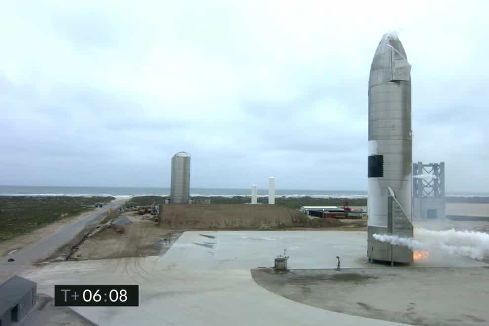 The Starship test vehicle sits on the ground after returning from a flight test in Boca Chica, Texas