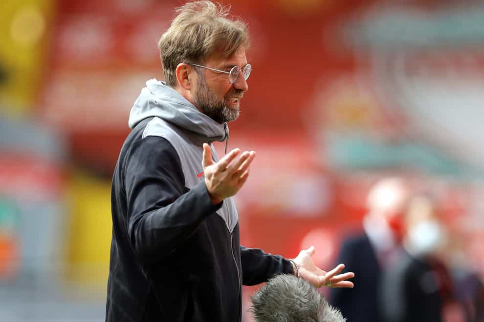 Liverpool manager Jurgen Klopp conducts a pitchside interview
