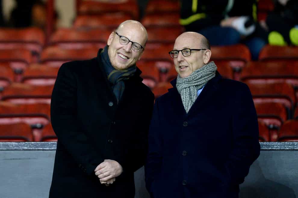 Manchester United co-chairman Joel Glazer, right, has written a letter to the club's supporters