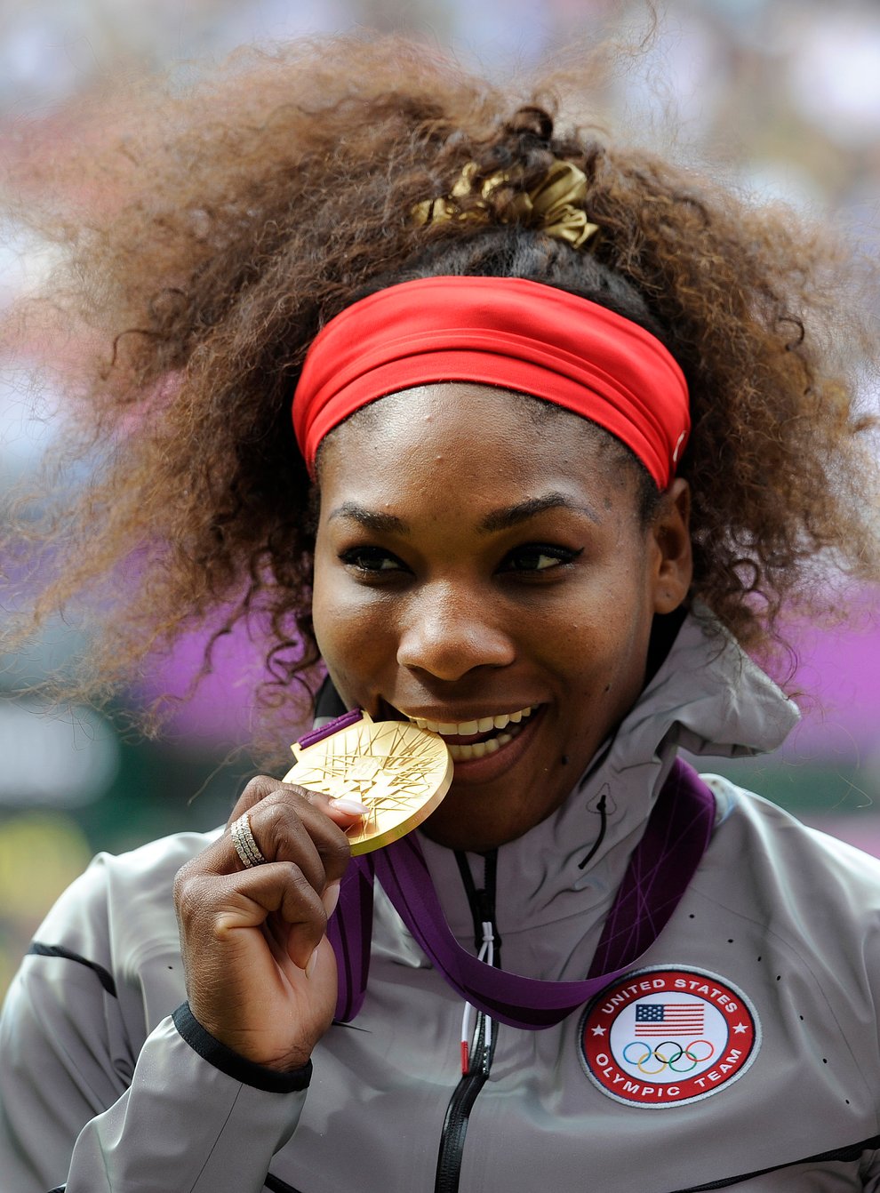 Serena Williams with her Olympics singles gold medal in London in 2012