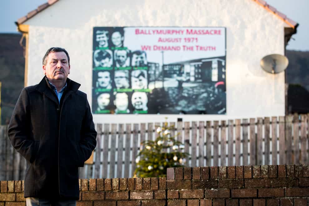 John Teggart, standing in the Ballymurphy area of west Belfast, where his father was among those killed