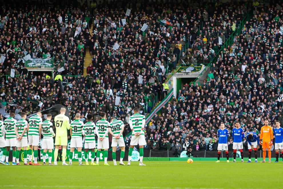 A minute's applause before a match between Celtic and Rangers