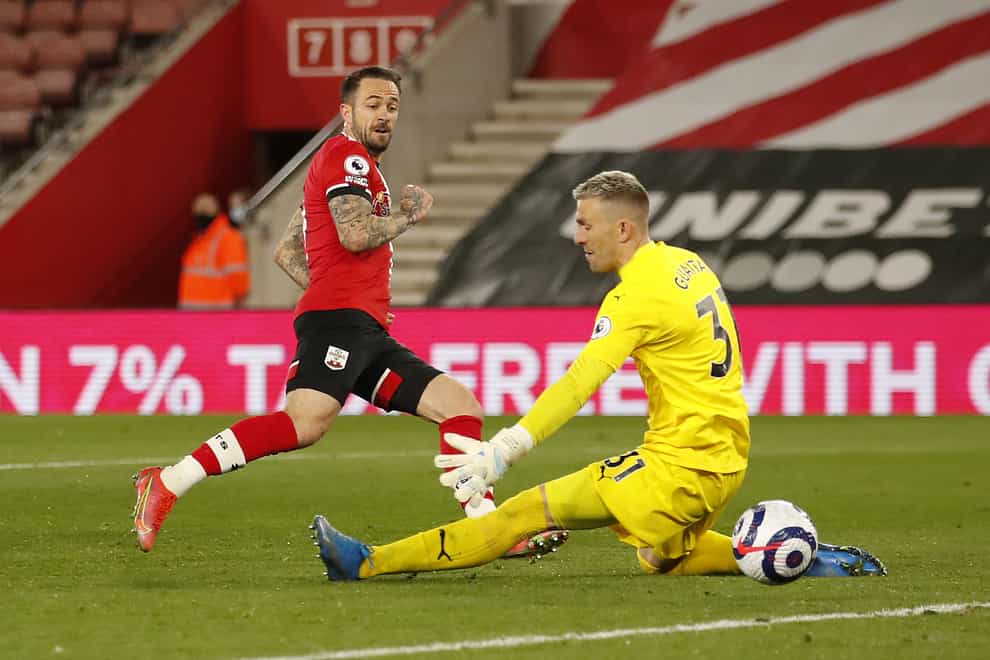 Danny Ings, left, slots home Southampton’s third goal