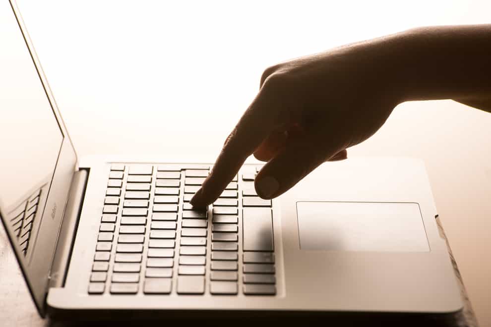 A woman using a laptop