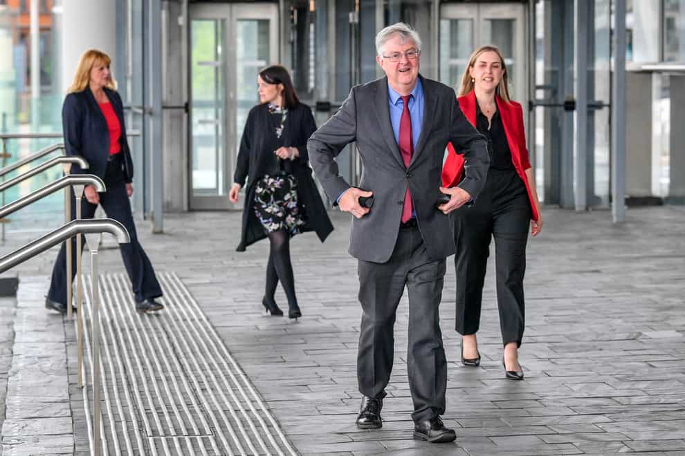 Wales First Minister Mark Drakeford arrives at the Senedd in Cardiff Bay