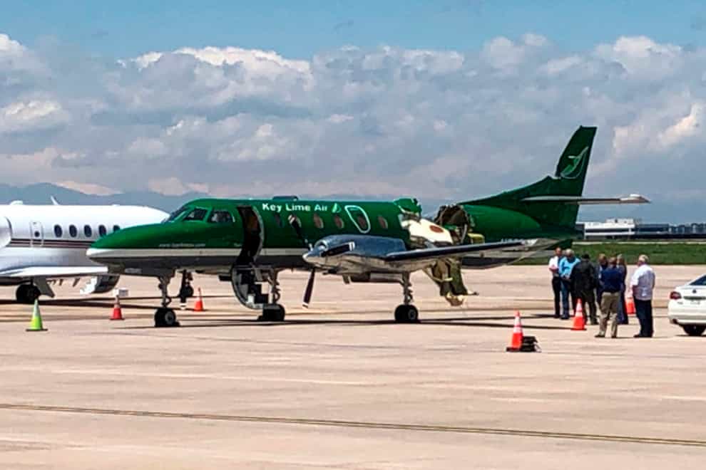 A Key Lime Air Metroliner that landed safely at Centennial Airport after a mid-air collision near Denver