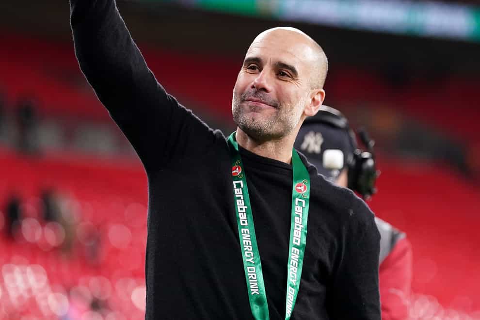 Pep Guardiola punches the air in delight