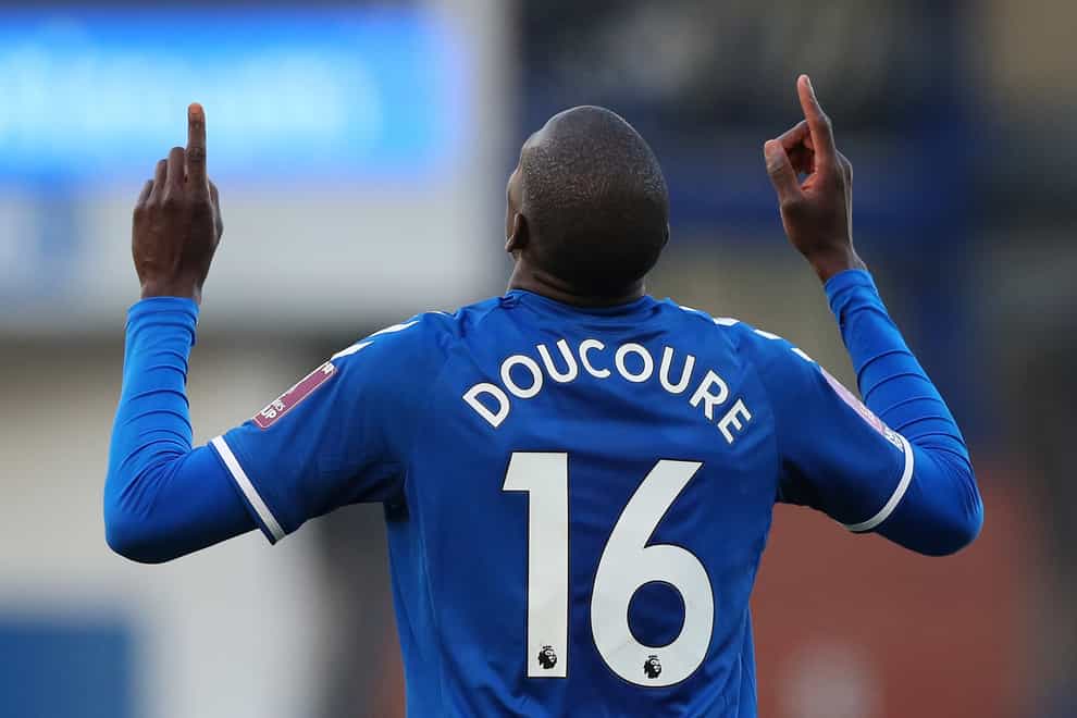 Everton’s Abdoulaye Doucoure points to the sky