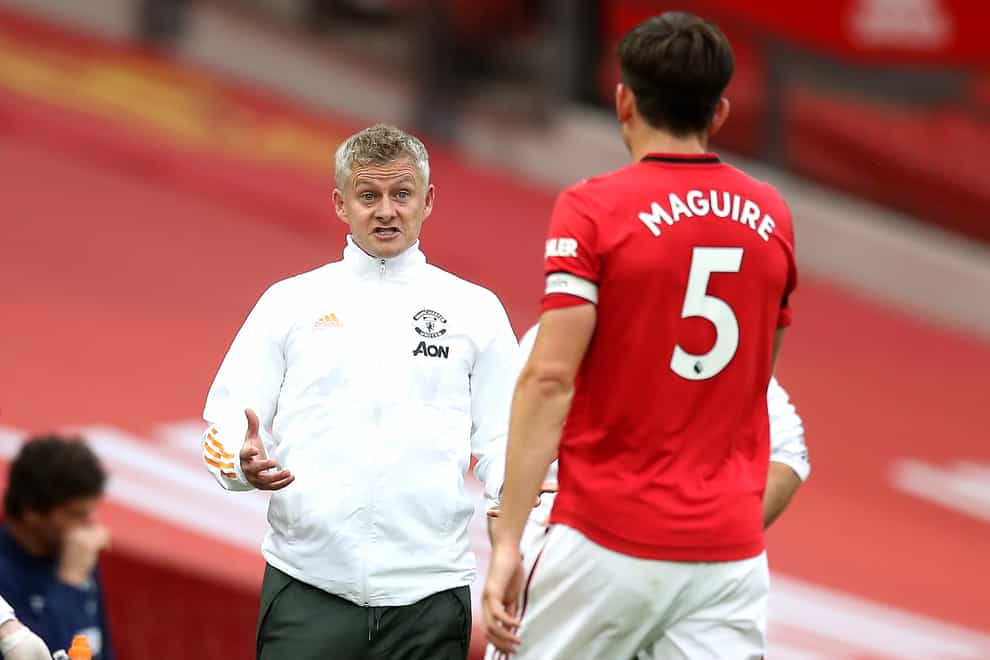 Manchester United manager Ole Gunnar Solskjaer (left) is hopeful of having captain Harry Maguire fit for the Europa League final.