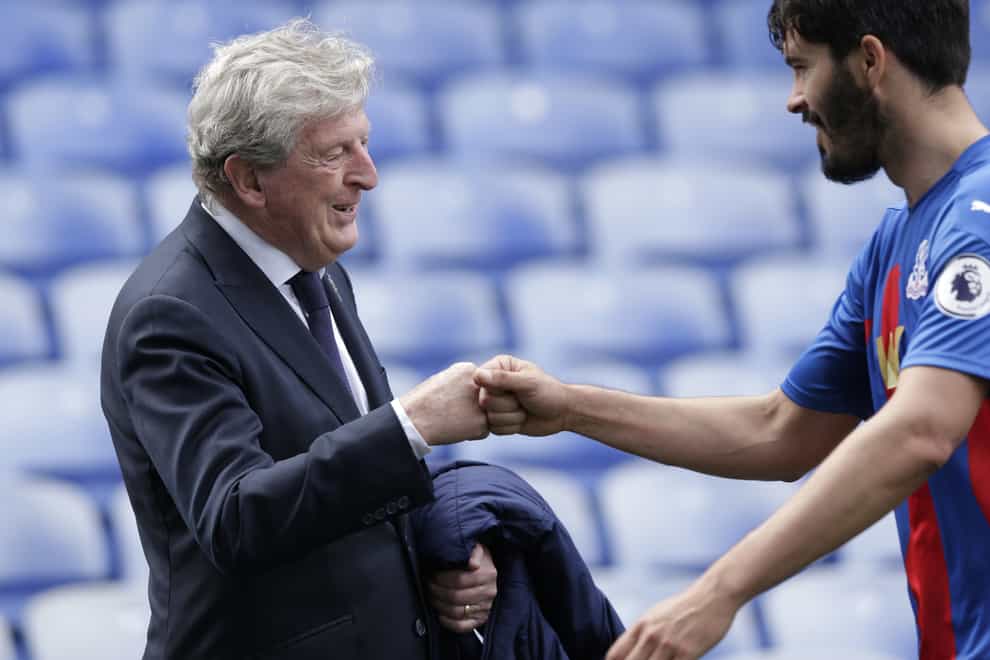 Roy Hodgson greets James Tomkins
