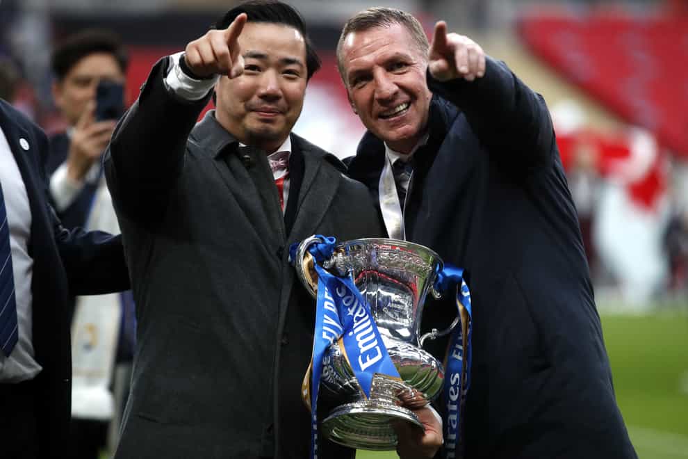 Brendan Rodgers (right) celebrates with Leicester chairman Aiyawatt Srivaddhanaprabha (left) after the FA Cup final win over Chelsea (Matthew Childs/PA).