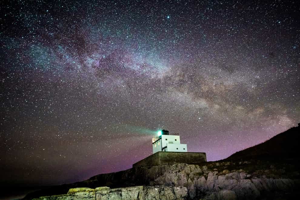 The Milky Way over Bamburgh Lighthouse in Northumberland
