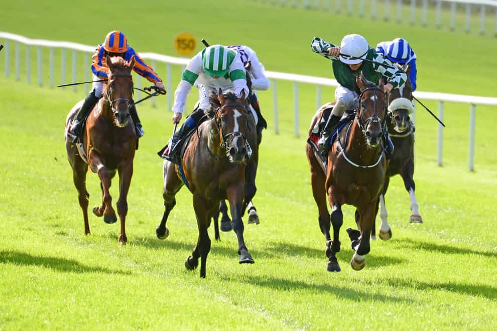 Laws Of Indices and jockey Chris Hayes (left) winning the GAIN Railway Stakes (Group 2) from Lucky Vega (right) at Curragh Racecourse
