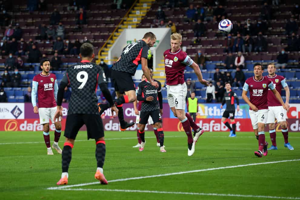 Nathaniel Phillips, centre left, scores Liverpool's second goal against Burnley at Turf Moor