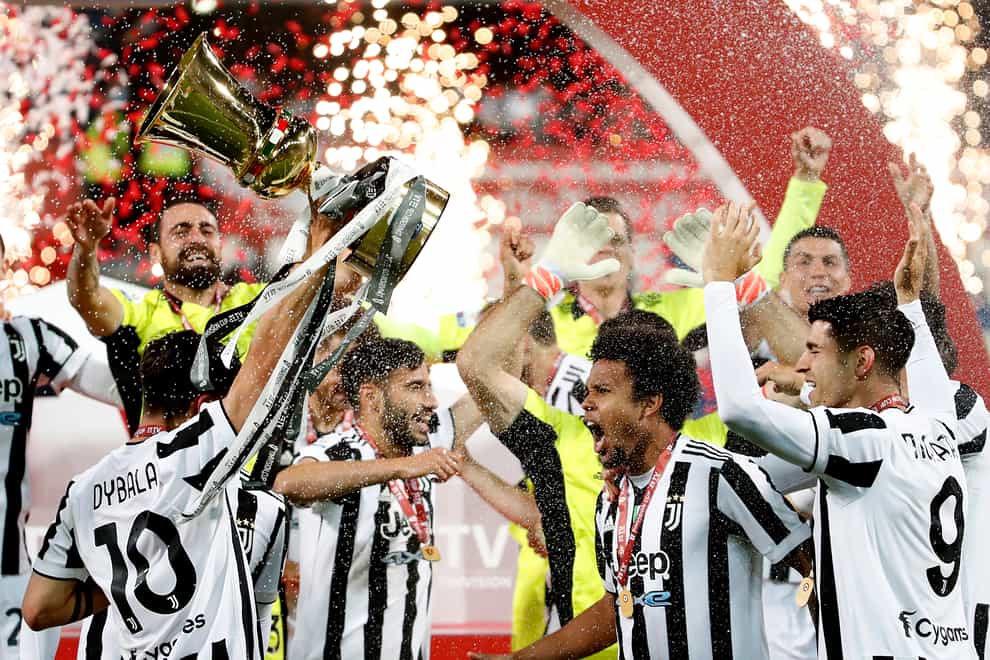 Juventus players celebrate after their victory against Atalanta in the Coppa Italia final