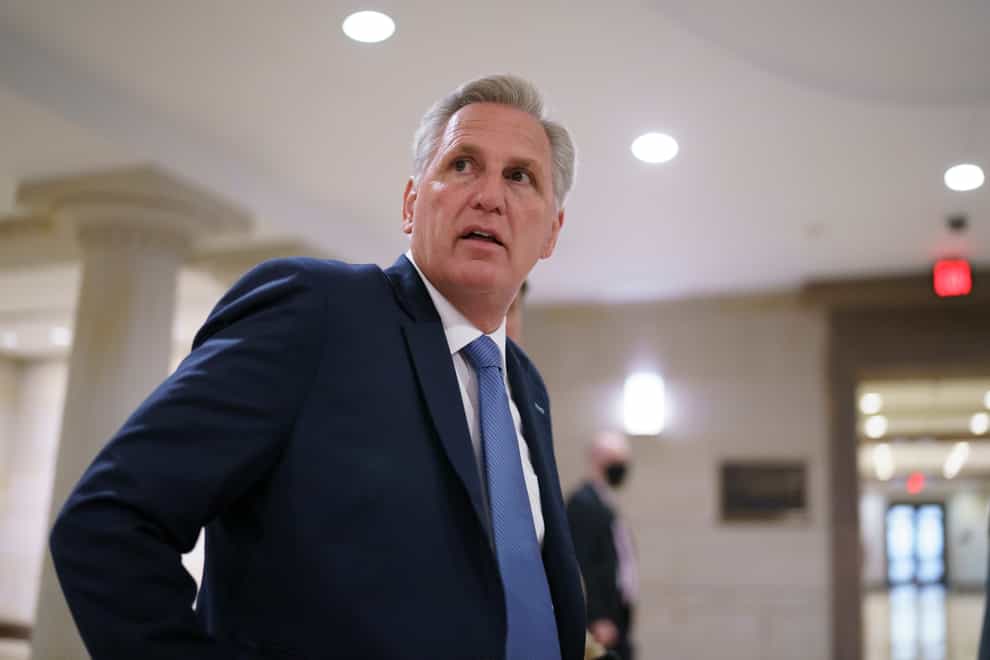 House minority leader Kevin McCarthy walking in the Capitol building without a mask