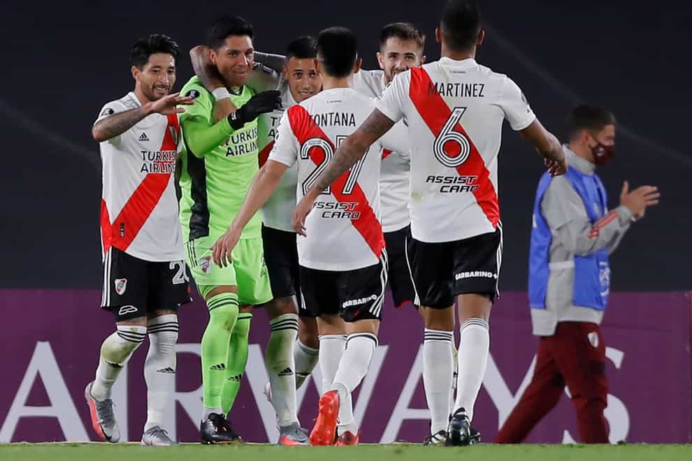 Argentina’s River Plate celebrate their 2-1 victory over Independiente Santa Fe
