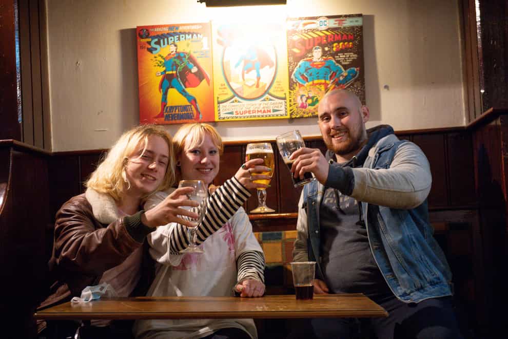 Pub customers toast return