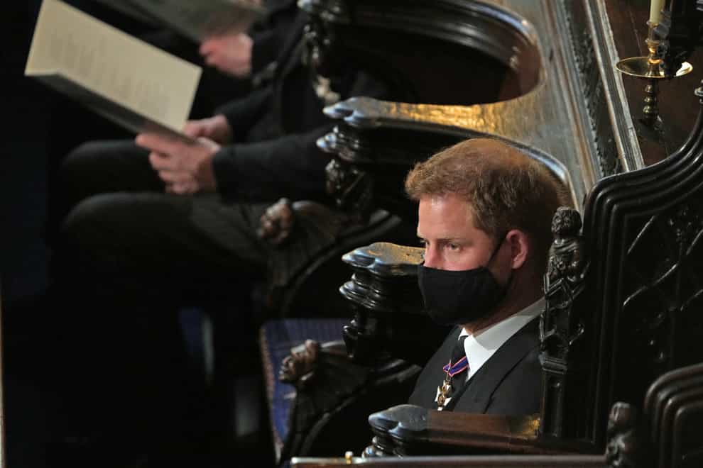 The Duke of Sussex wears a face mask during the funeral of the Duke of Edinburgh