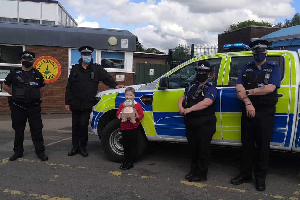Tilly and the officers at her school
