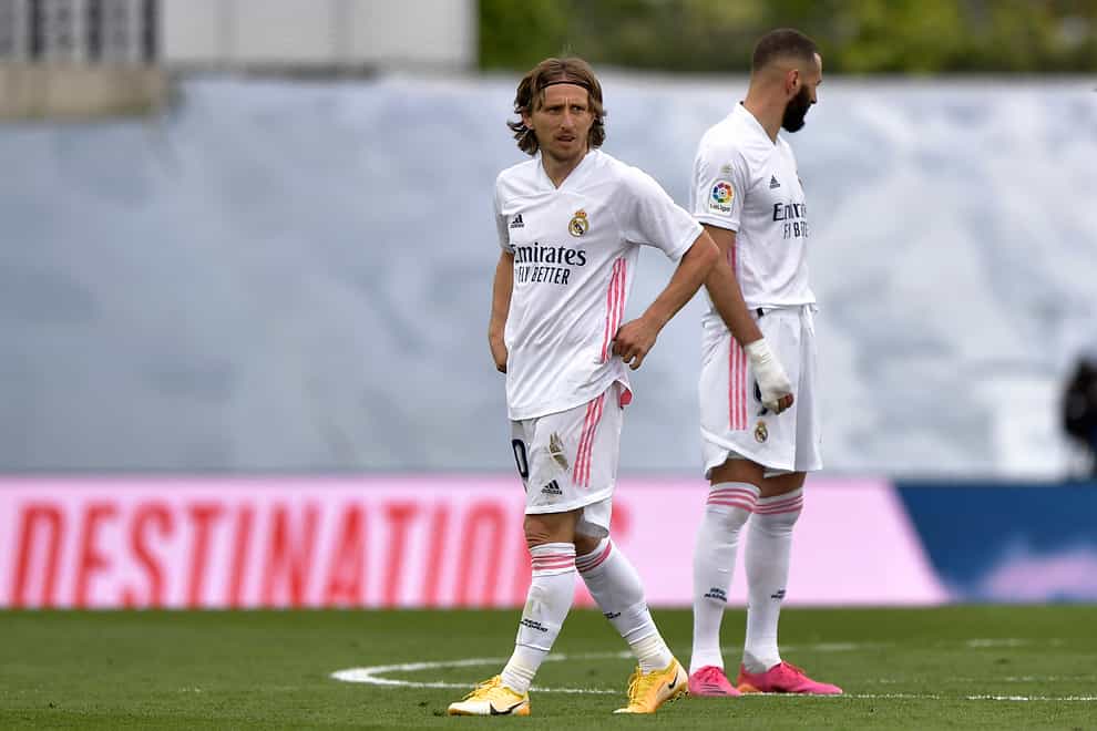 Luka Modric, left, and Karim Benzema scored for Real Madrid but crosstown rivals Atletico won the LaLiga title